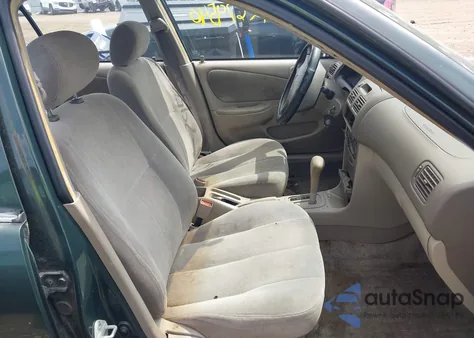 2001 Toyota Corolla Ce z USA, uszkodzony, nr VIN 2T1BR12E81C475853